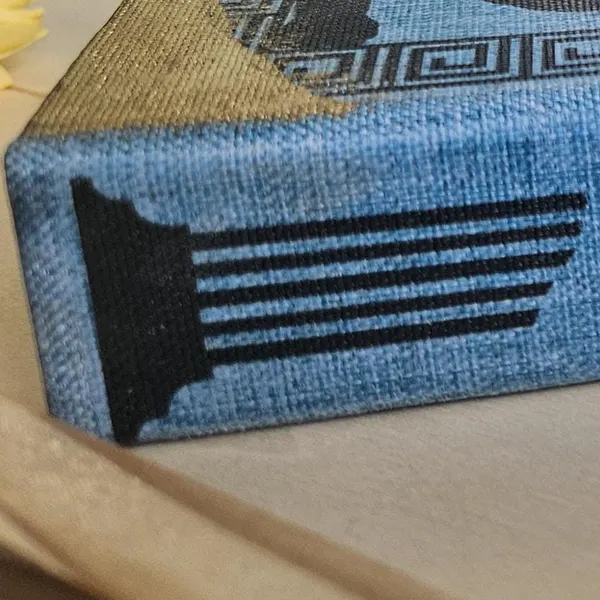 Blue cloth turned over a board corner