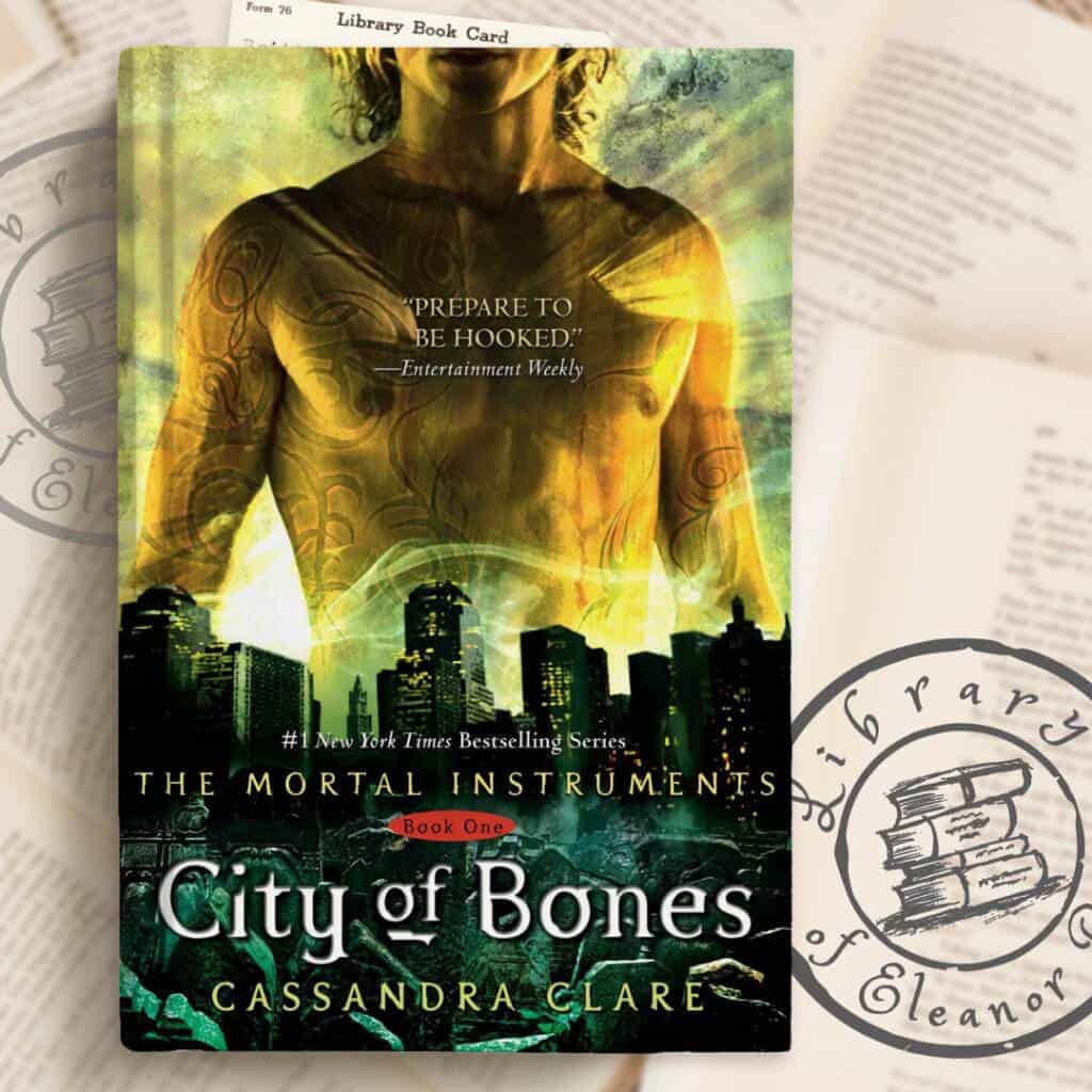 Book caled The Mortal Instruments by Cassandra Clare displayed as a book form one of the best ya fantasy series 